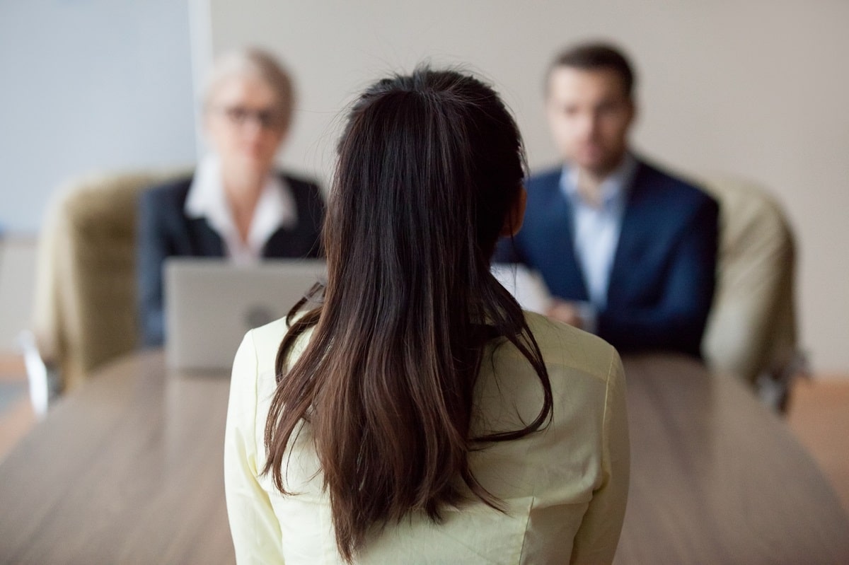 Businesswoman,And,Businessman,Hr,Manager,Interviewing,Woman.,Candidate,Female,Sitting