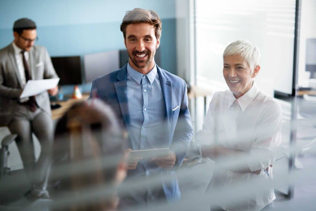 Collaboration and analysis by business people working in office