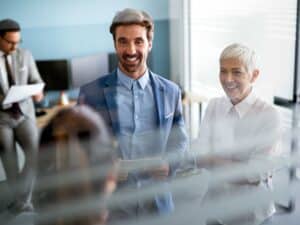 Collaboration and analysis by business people working in office