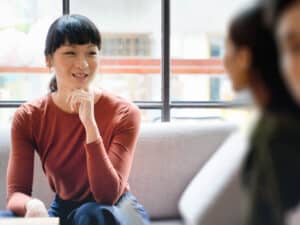 Young asian woman working in a modern co-working office