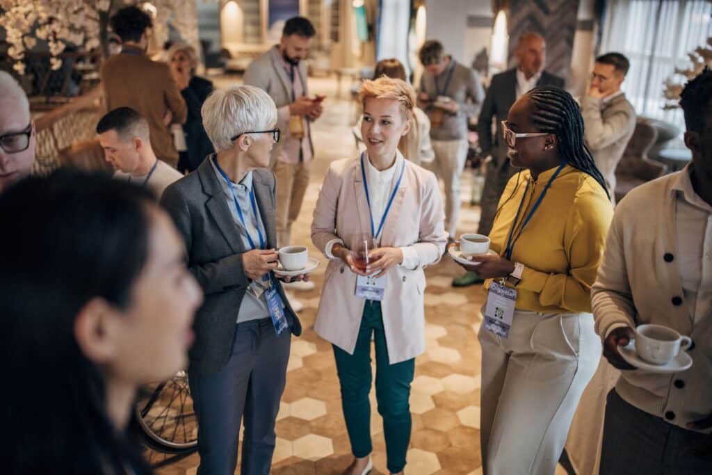 Group of people having a conversation at an event