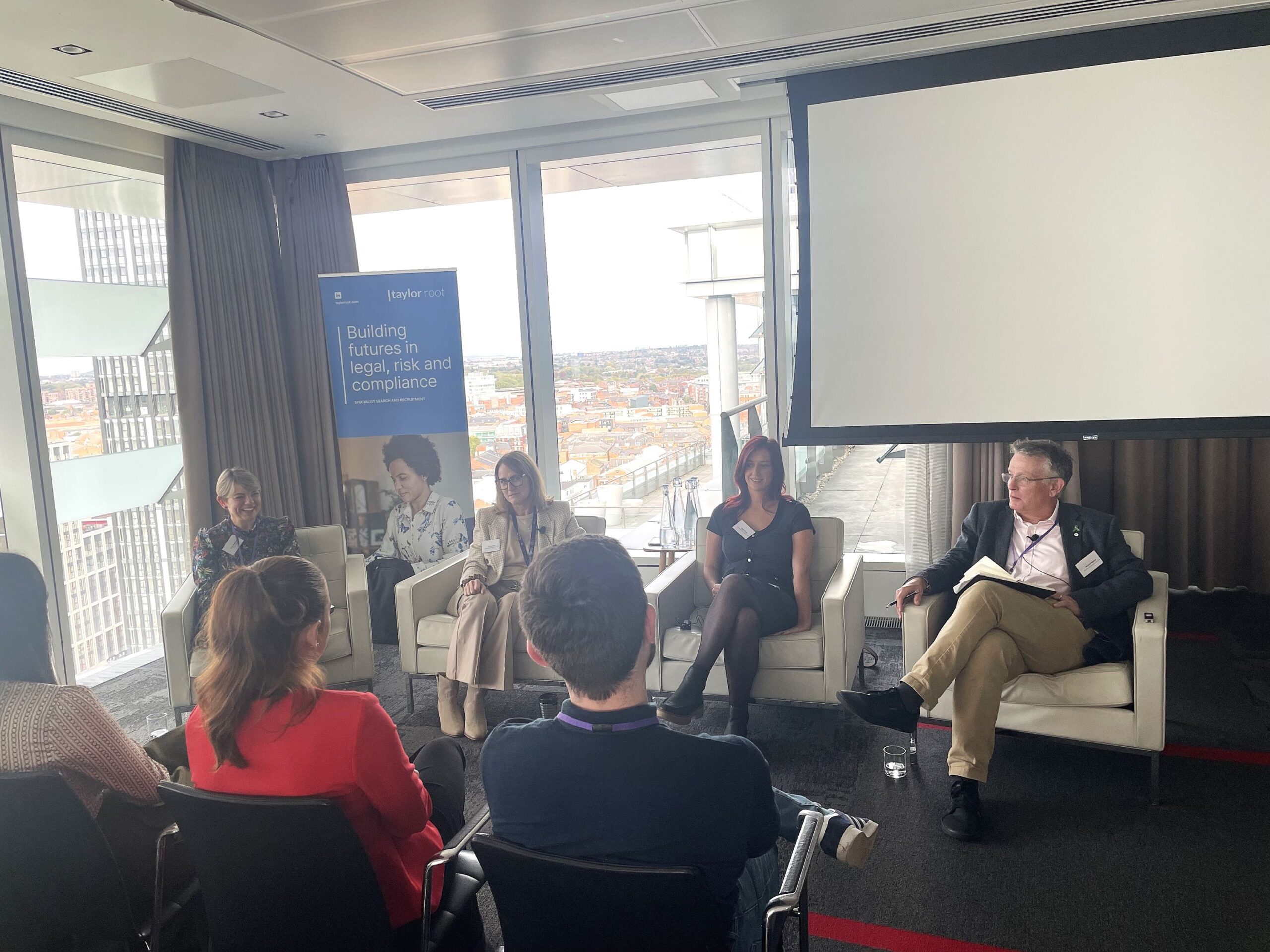 Panellists in front of an audience