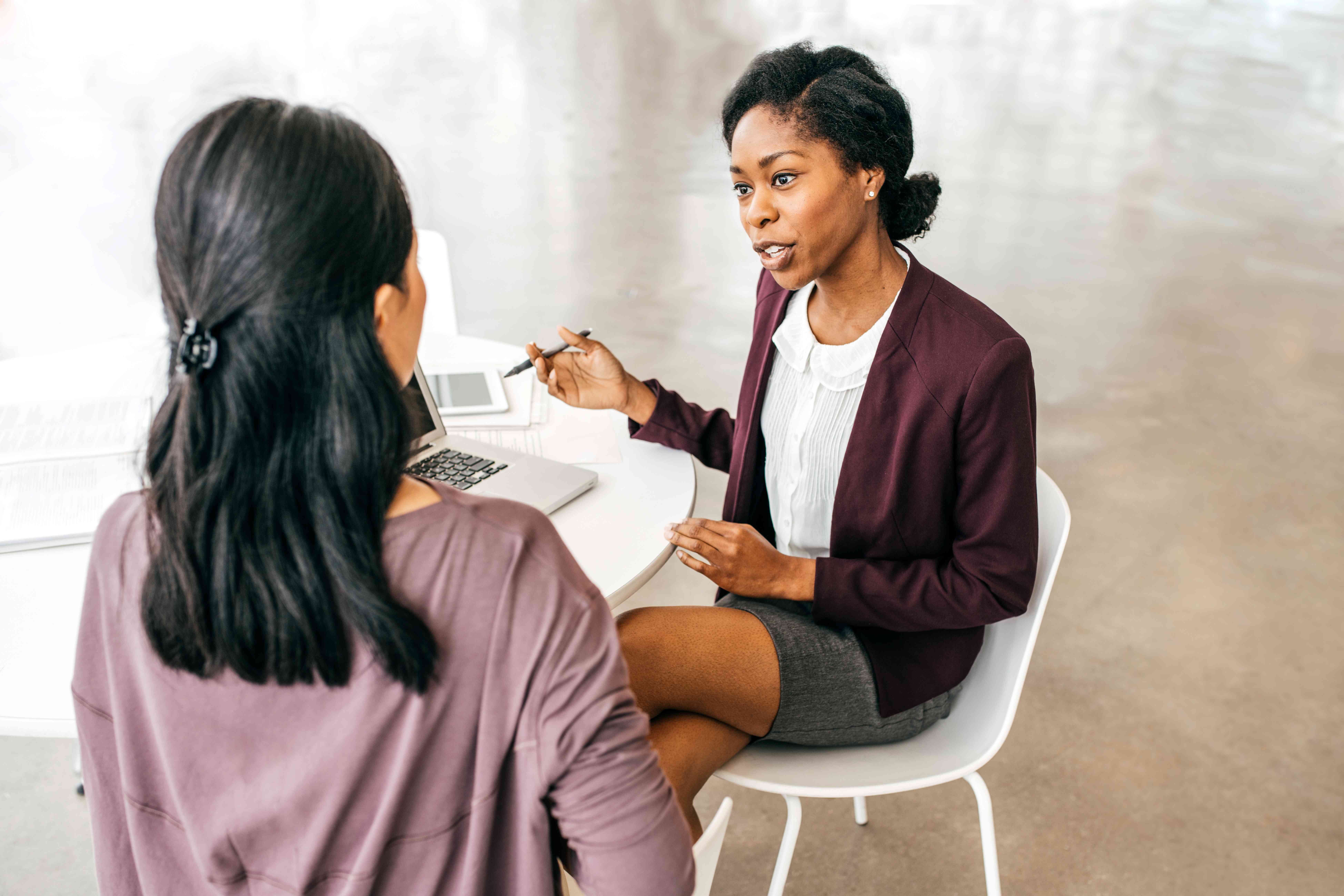 Two people in discussion