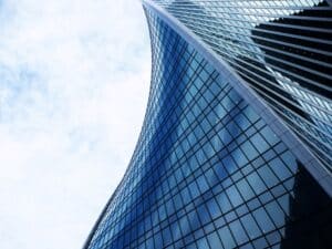 Futuristic building against a blue sky