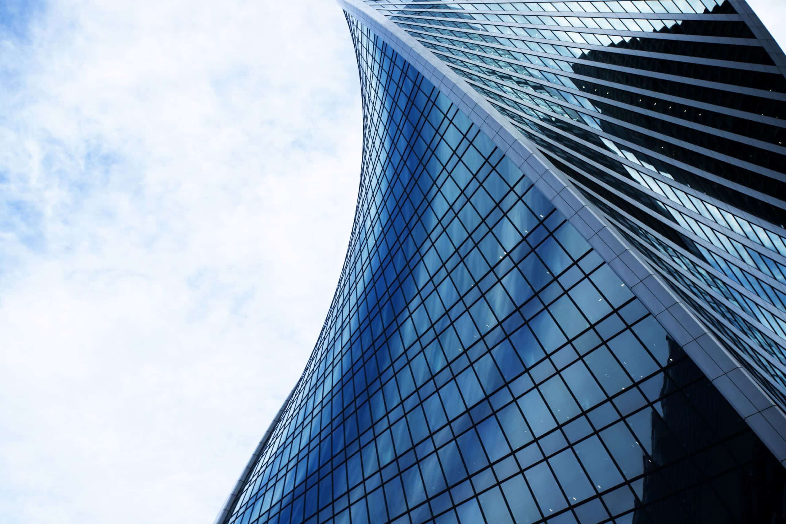 Futuristic building against a blue sky