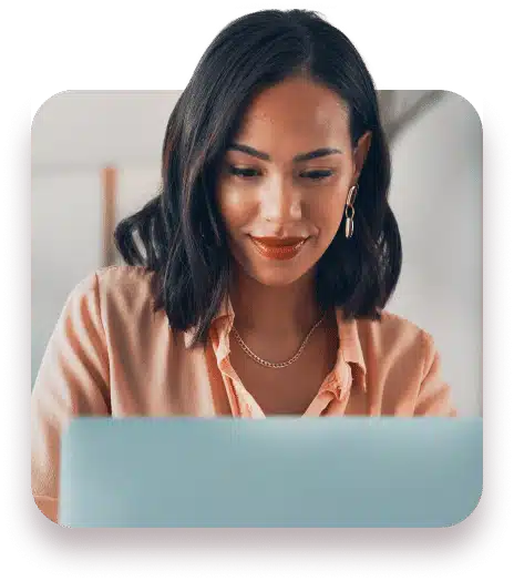 woman looking at laptop