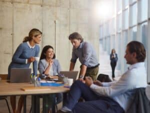 Group of happy entrepreneurs working on a meeting in the office.